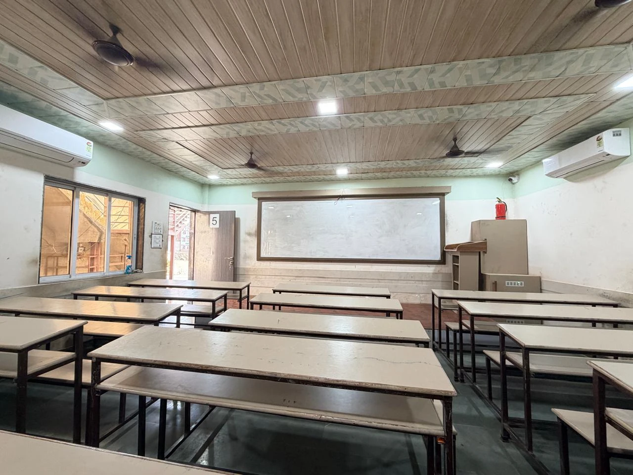Air-conditioned classroom with whiteboard at Sankalp Tutorials